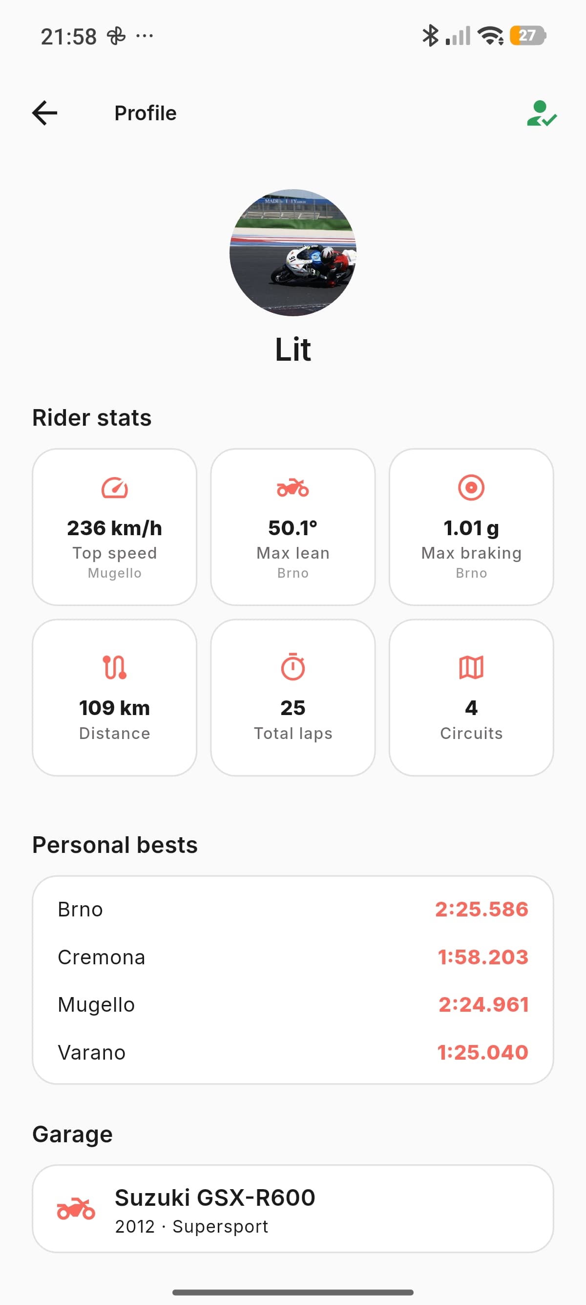 Profile screen: personal records, progress history, bikes and track days.